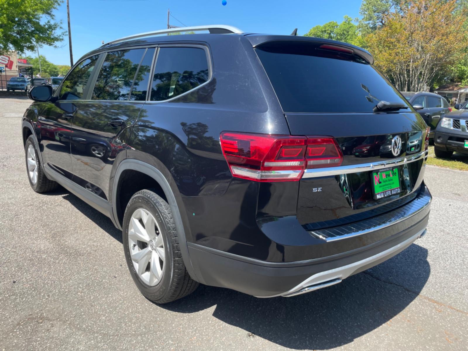 2019 BLACK VOLKSWAGEN ATLAS V6 SE (1V2DR2CA0KC) with an 3.6L engine, Automatic transmission, located at 5103 Dorchester Rd., Charleston, SC, 29418-5607, (843) 767-1122, 36.245171, -115.228050 - Local Trade-in with Leather, Third Row, Backup Camera, AUX/Bluetooth/USB, Dual Climate Control, Power Everything (windows, locks, seats, mirrors), Heated Seats, Rear In-door Sunshades, Push Button Start, Keyless Entry, Alloy Wheels. 121k miles Located at New Life Auto Sales! 2023 WINNER for Post & - Photo #4